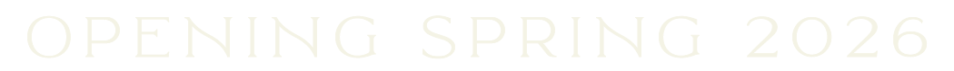 Text reading 'Opening Spring 2026' in light colors on a white background.
