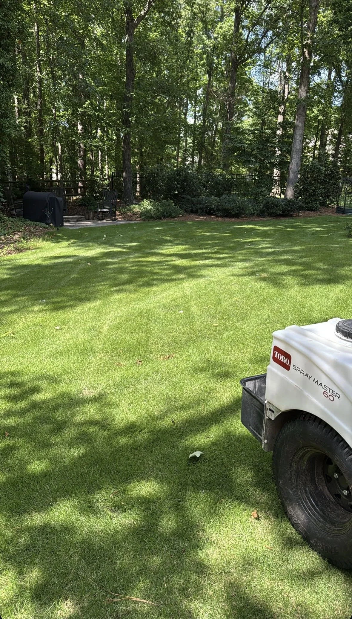 Dense zoysia grass lawn with Toro Spray Master lawn equipment