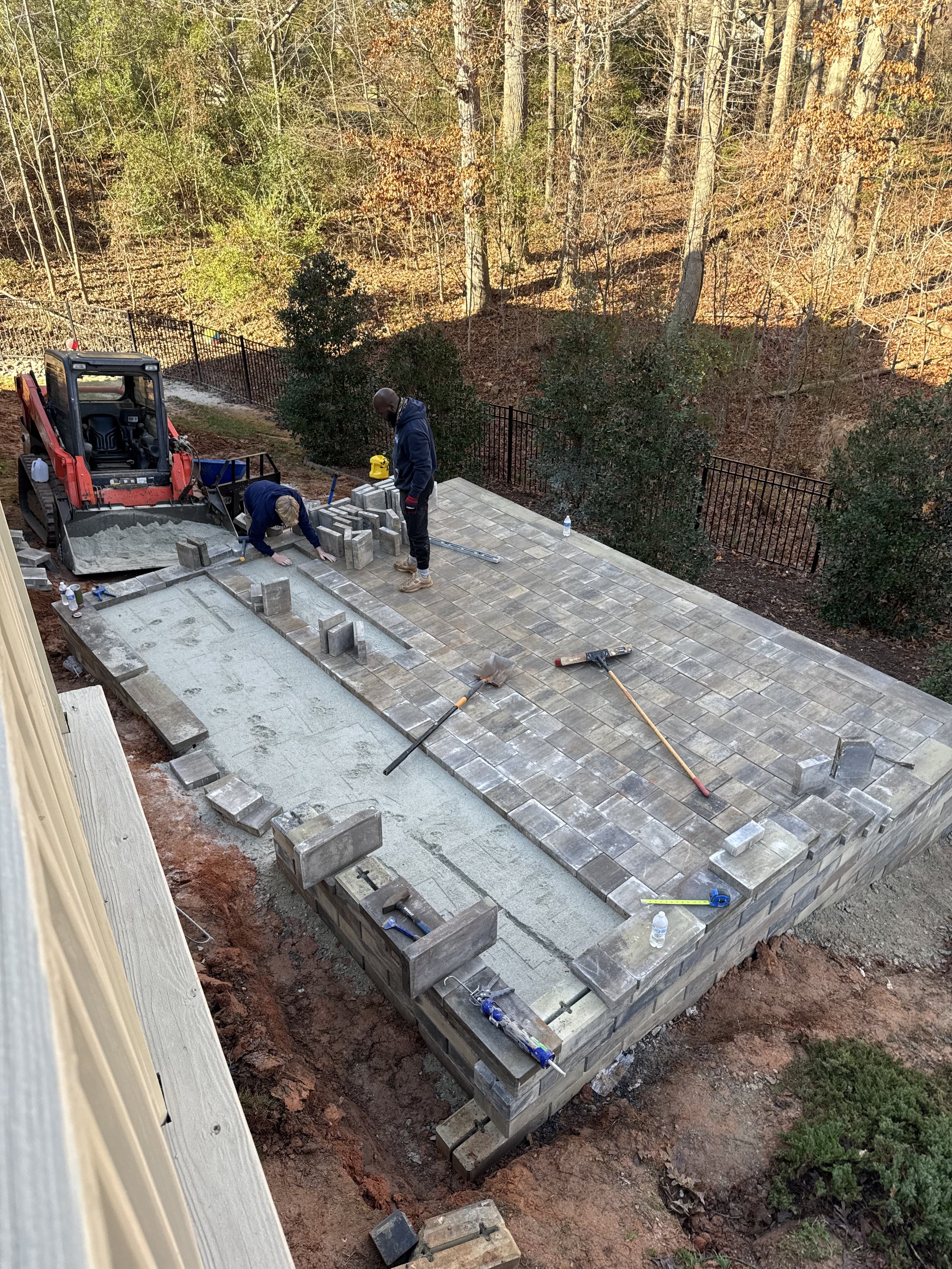 Stone paver patio mid-installation