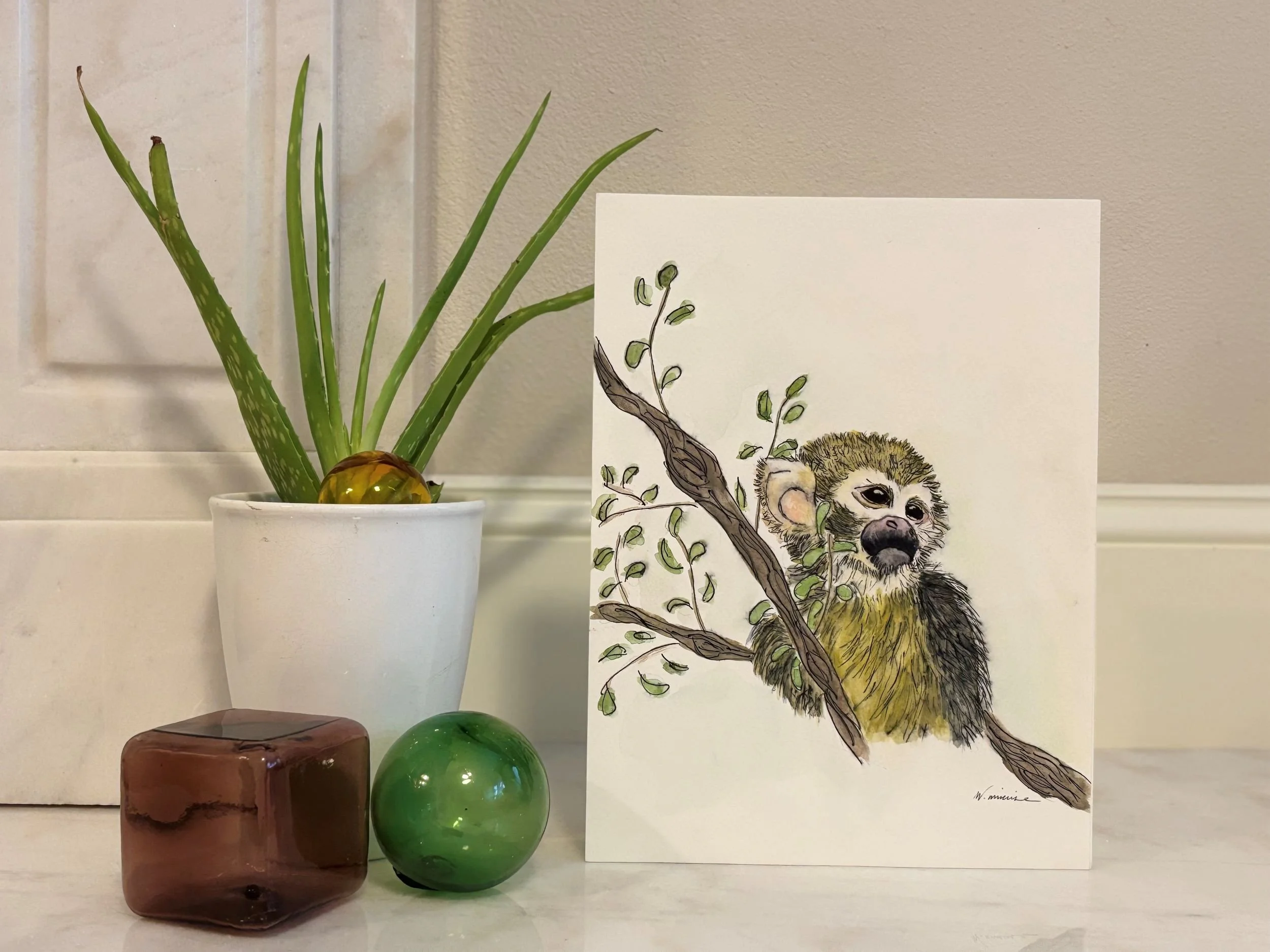 Detail of Mortimer watercolor painting showing the monkey’s expressive eyes and lively posture
