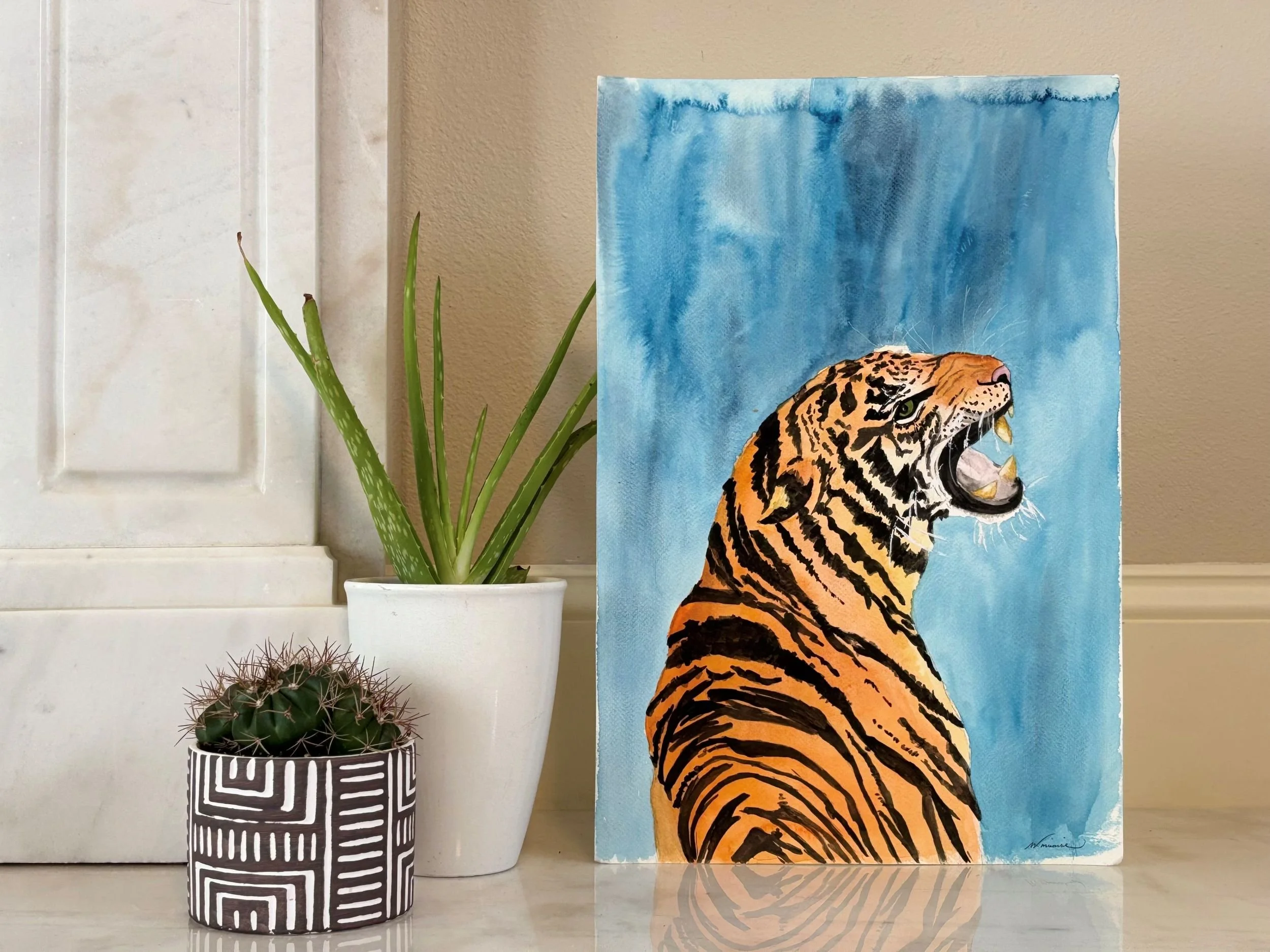 Detail of Hectar watercolor painting showing the tiger’s intense expression and contrasting colors