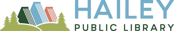 Logo of Hailey Public Library featuring stylized books and trees.