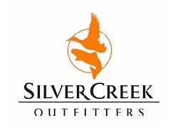 Silver Creek Outfitters logo with a silhouette of a fish jumping in an orange circle.