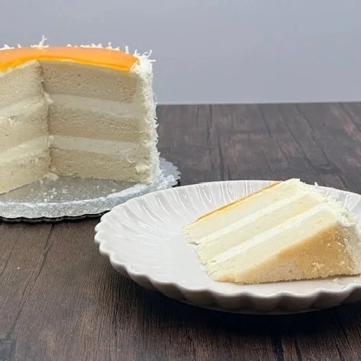 Coconut+Mango+Cake+cut+.jpg
