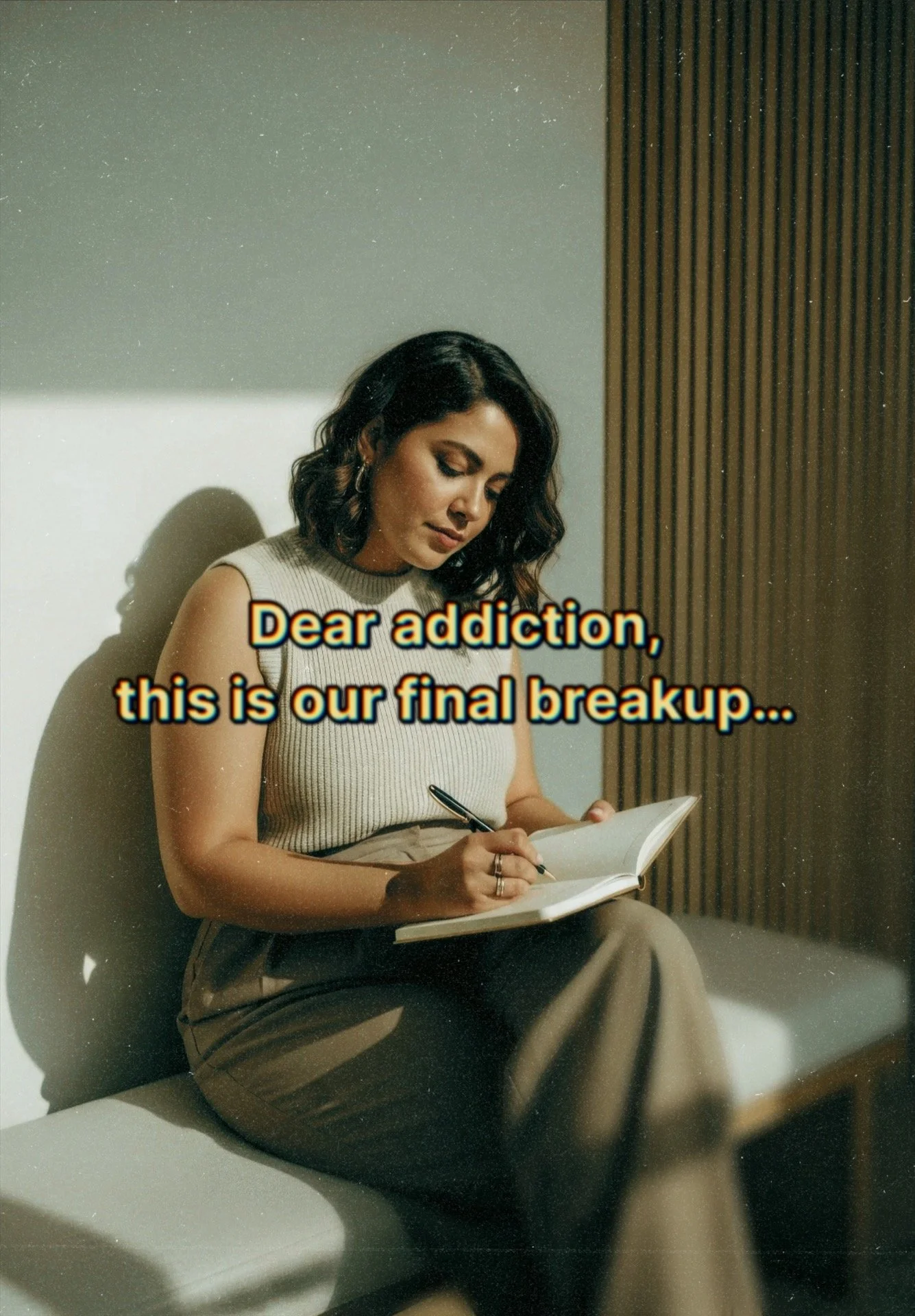 A woman with dark wavy hair, wearing a beige sleeveless top and beige pants, sitting on a bench and writing in a notebook, with the text 'Dear addiction, this is our final breakup...' overlaying the image.