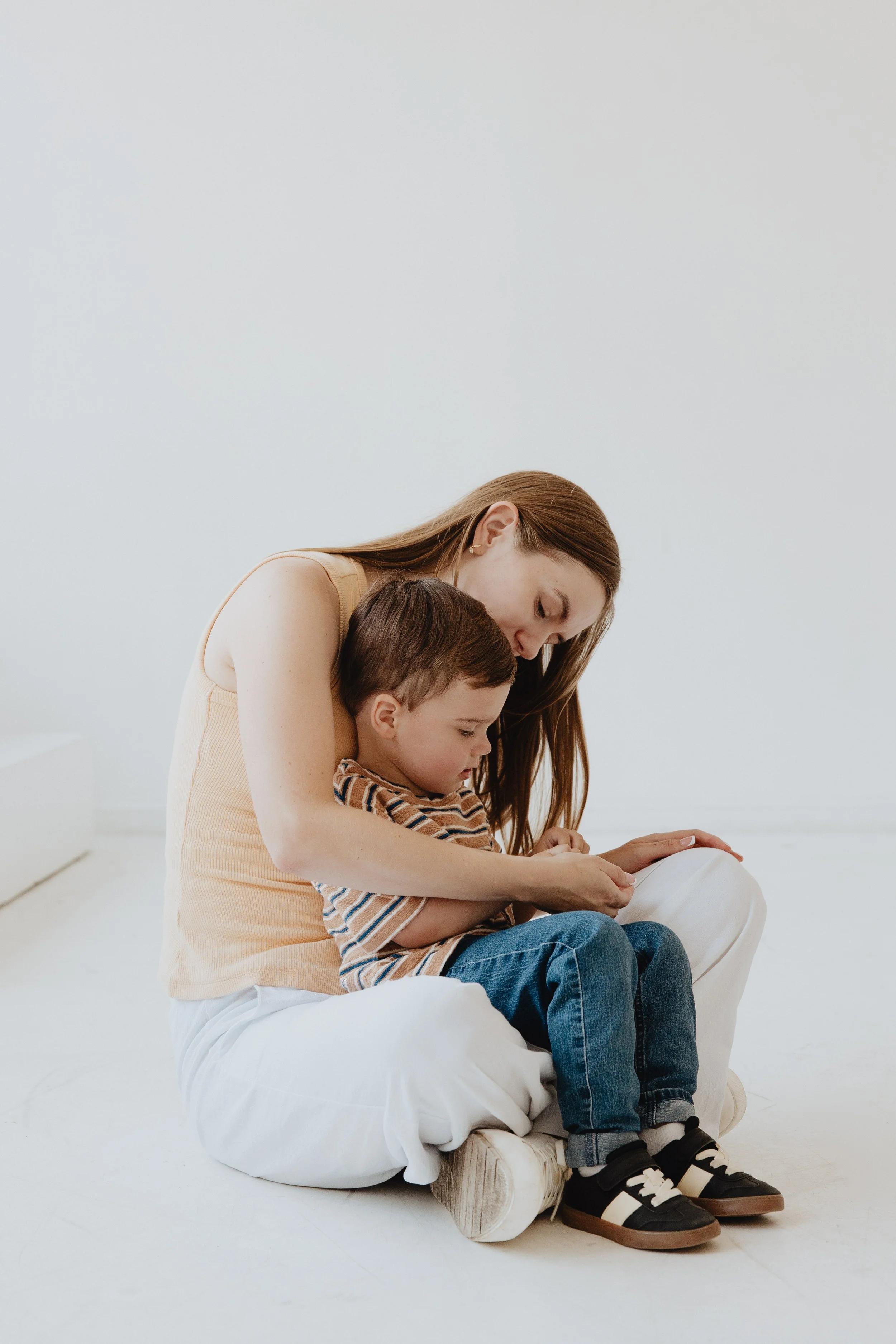Toddler sitting in adult lap