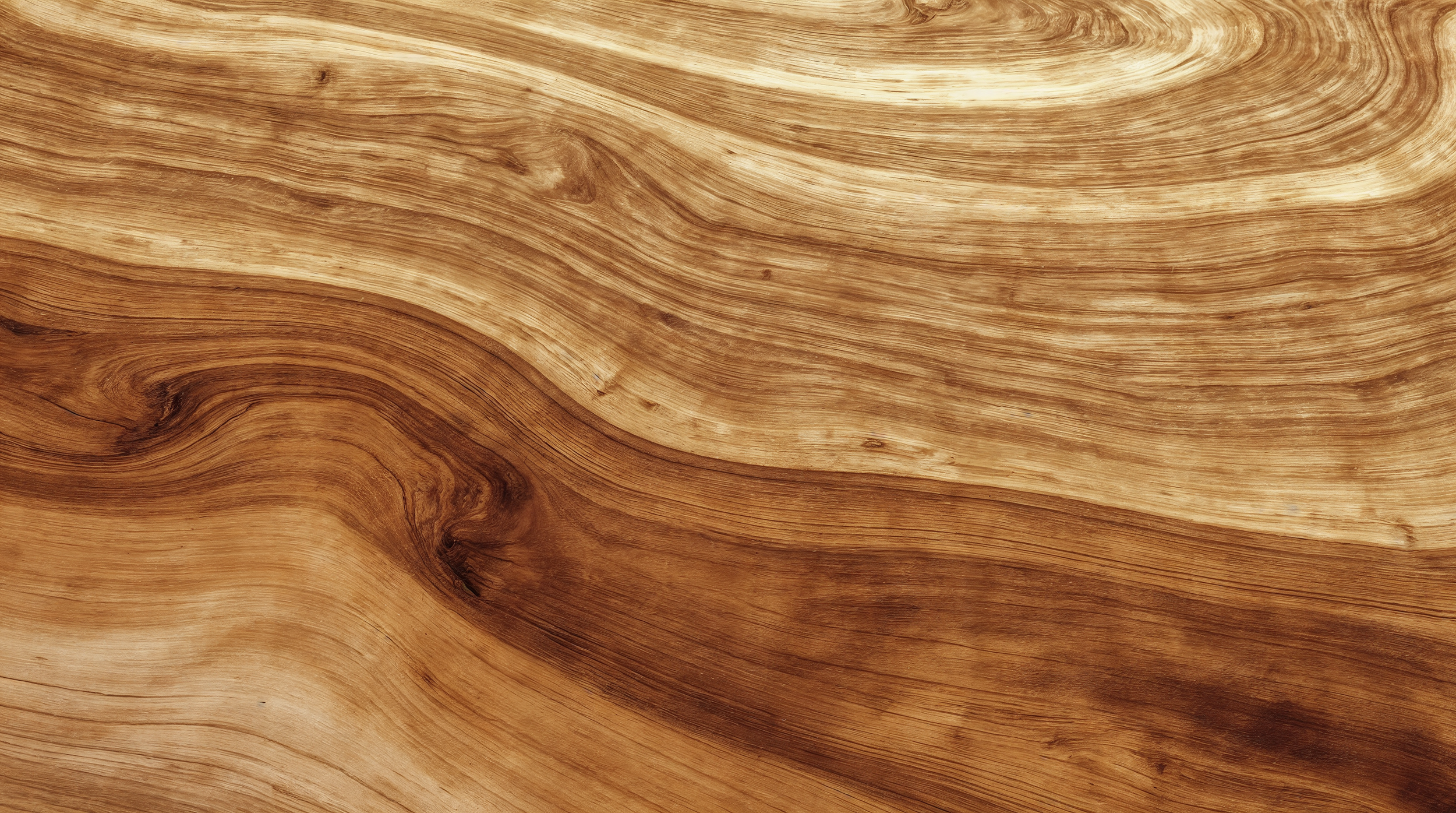 Close-up of a smooth, wavy wooden surface with natural grain patterns and varying shades of brown.