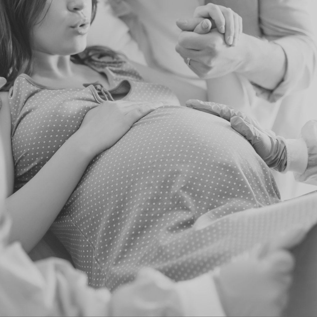 Portland birth doula providing hands-on labor support during childbirth.