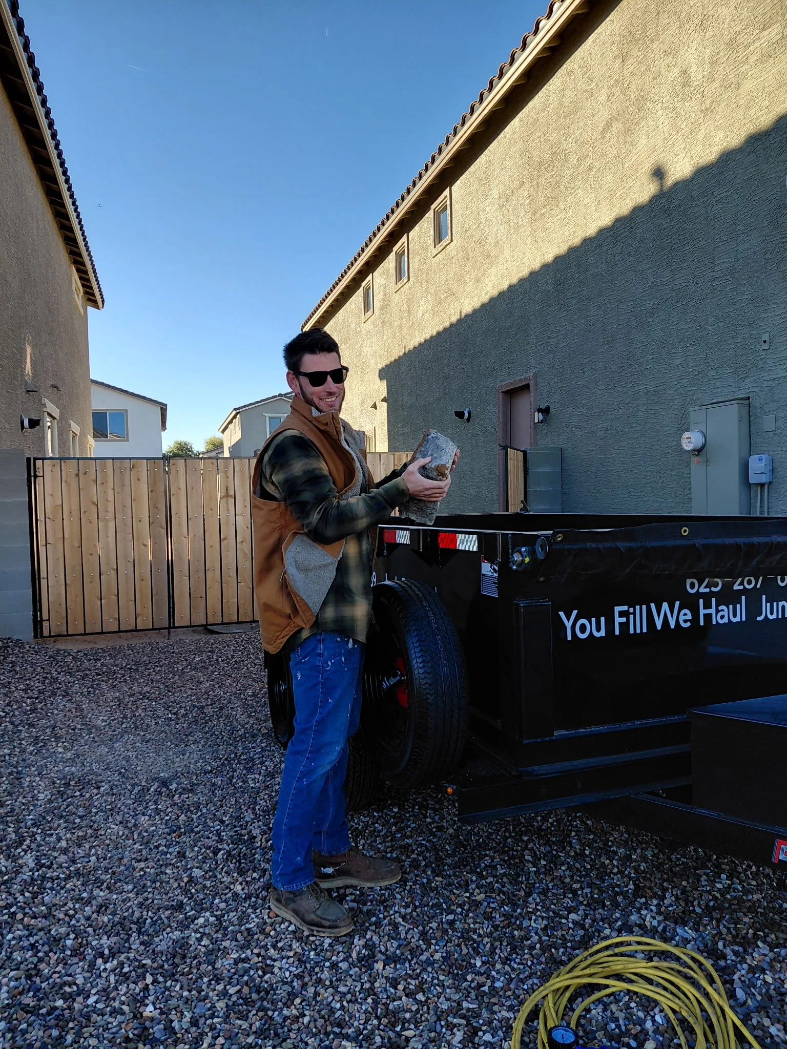Load at your pace with our You Fill / We Haul service in Phoenix AZ. Dump fees included, driveway-safe trailers & easy scheduling.