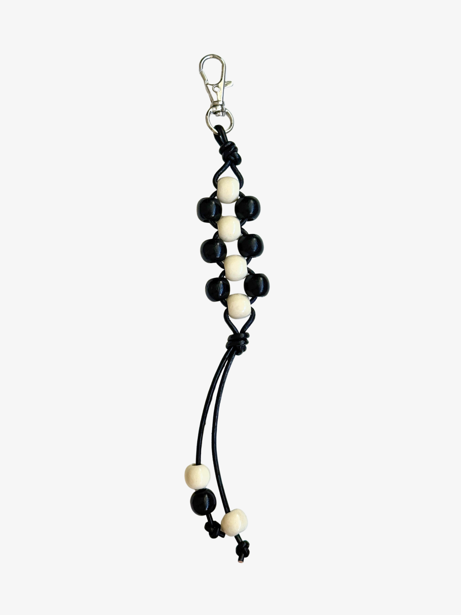 the ego knot bag charm | black + off-white