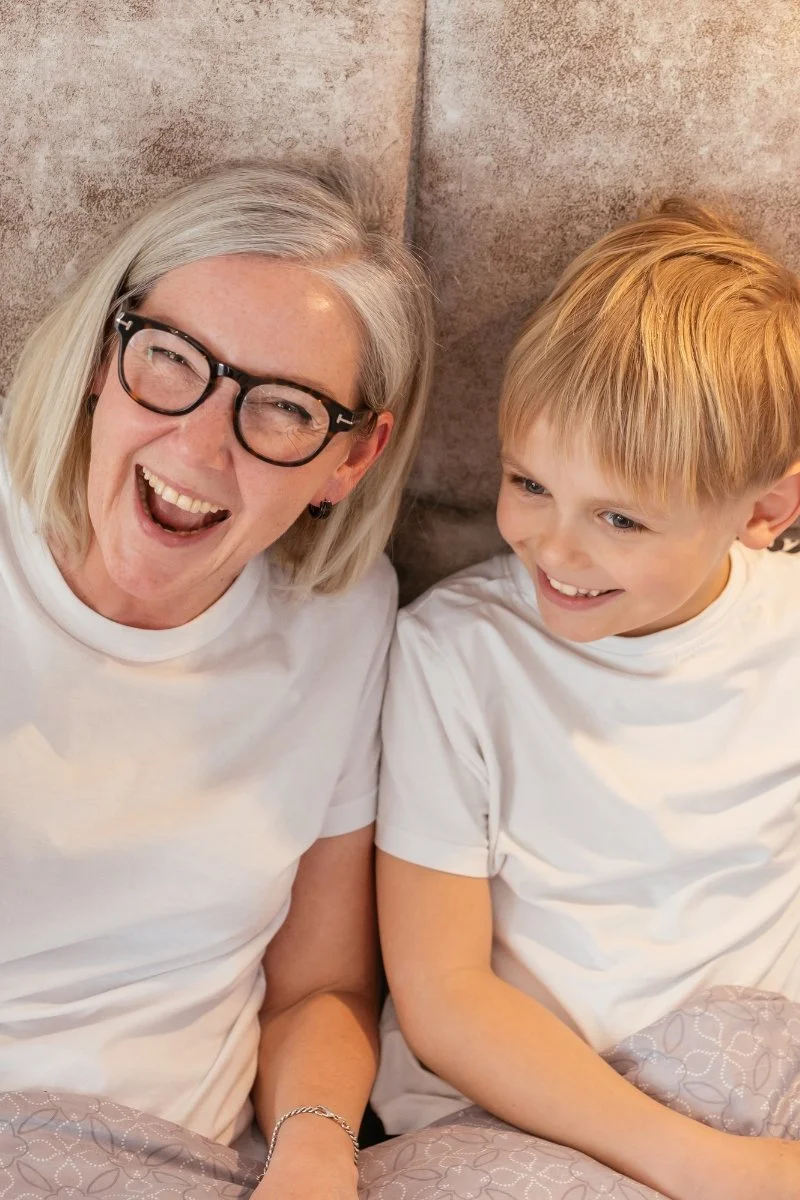 grandma and boy laughing