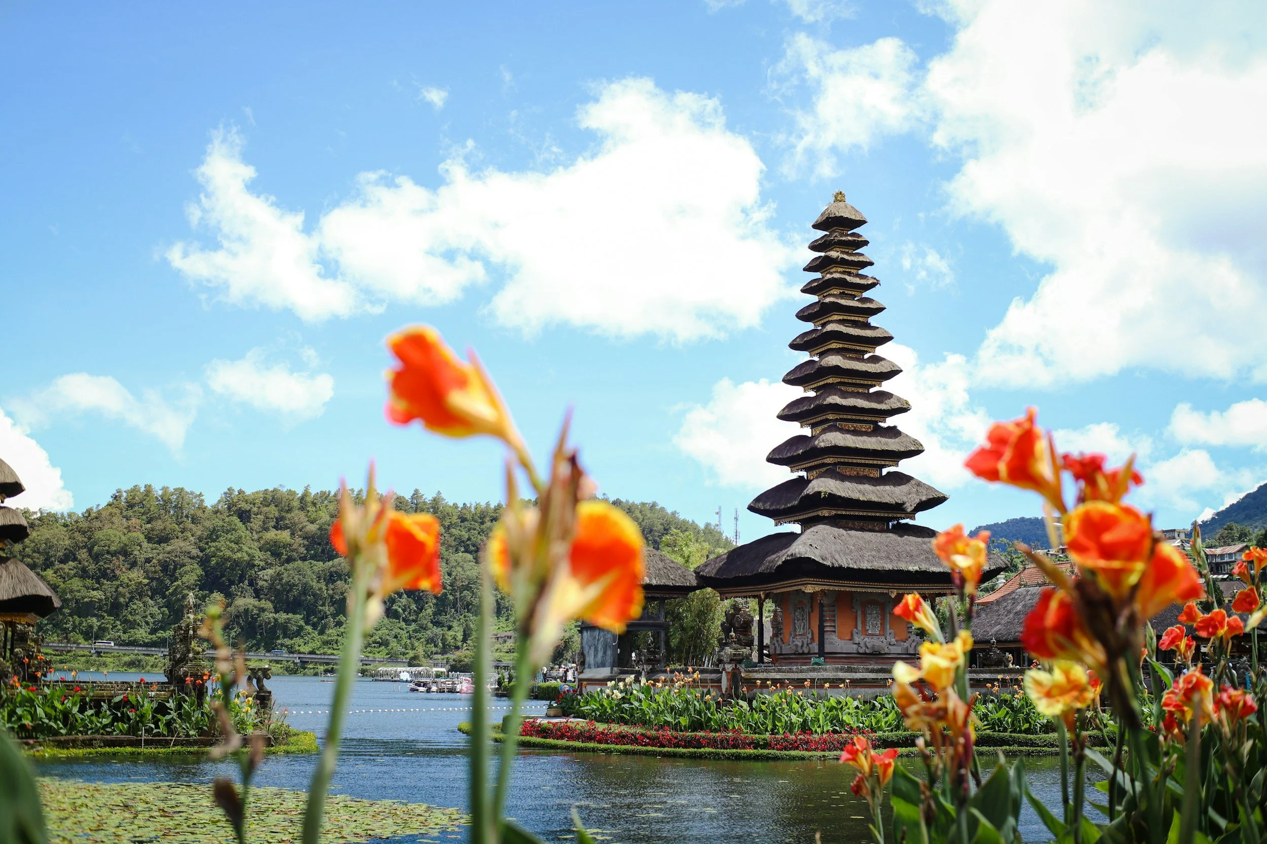 Traditional Balinese temple by the water, evoking ritual, grounding, and stillness.