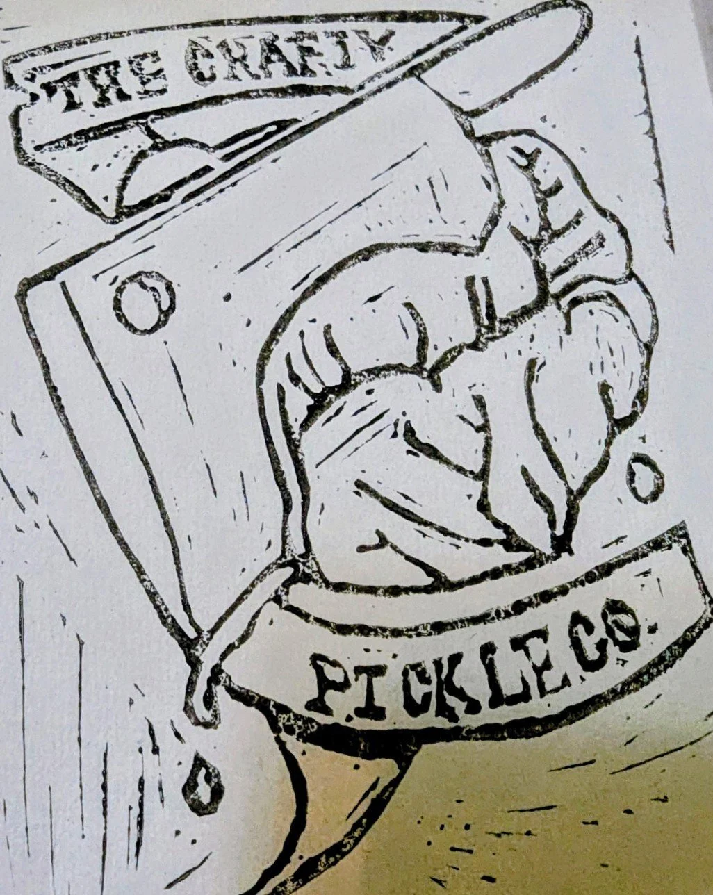 Lino print of the logo for The Crafty Pickle Co.