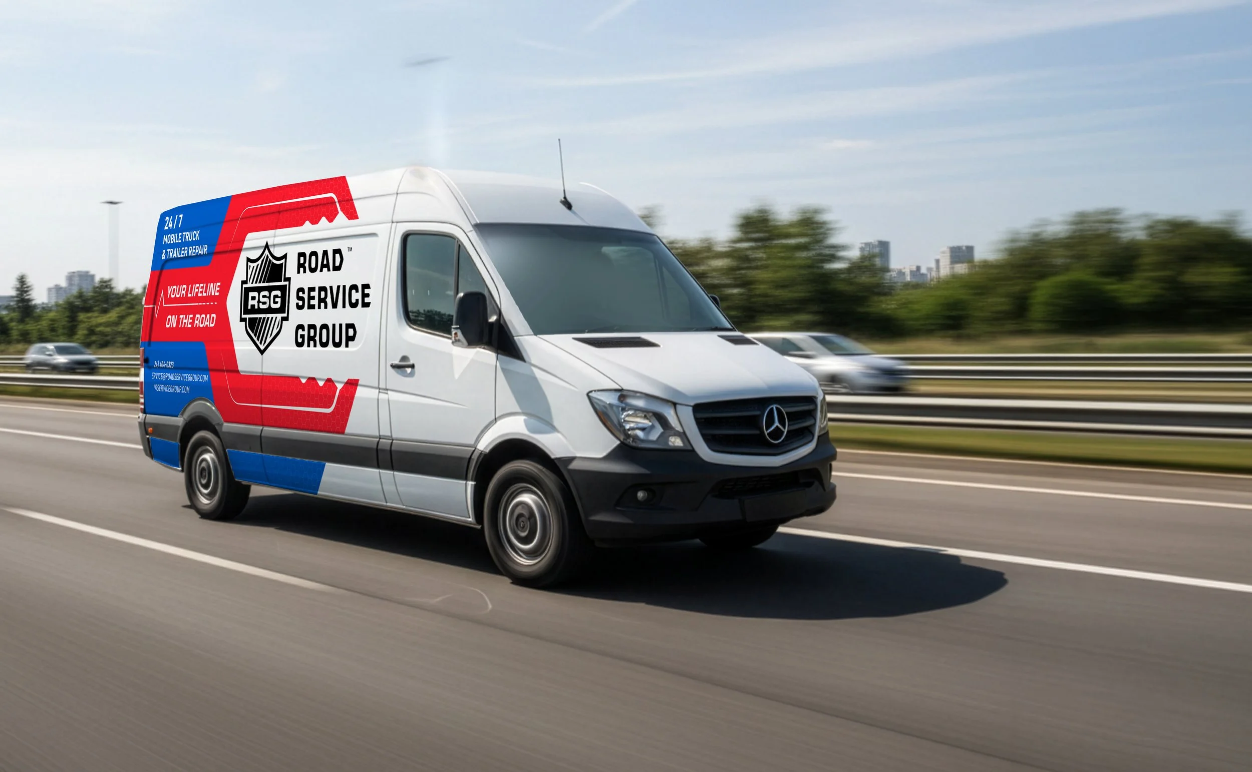 White Mercedes-Benz service van with RSG Road Service Group logo driving on highway during daytime.