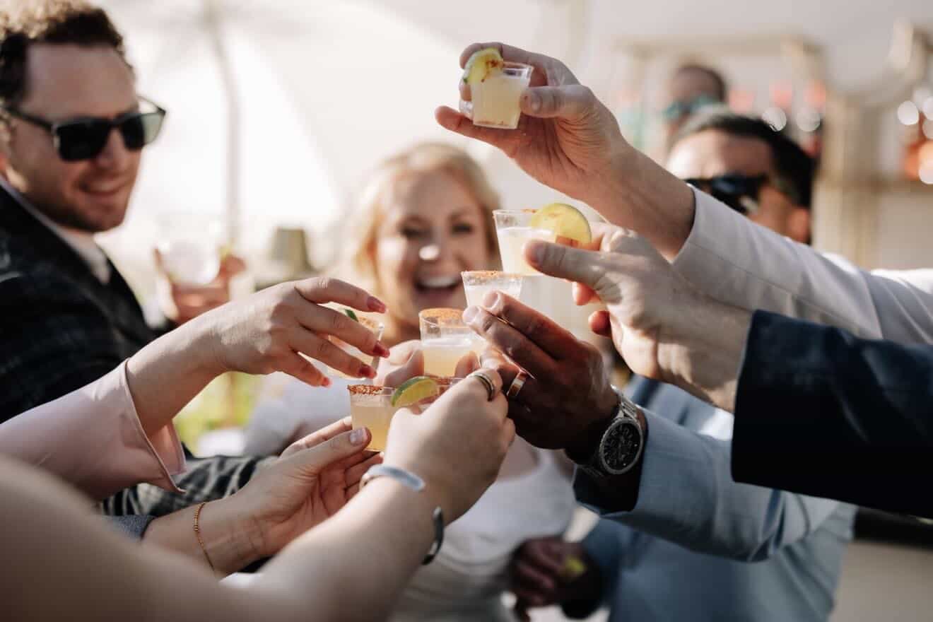 Wedding guests enjoying cocktail hour with Jacksonville mobile bartender
