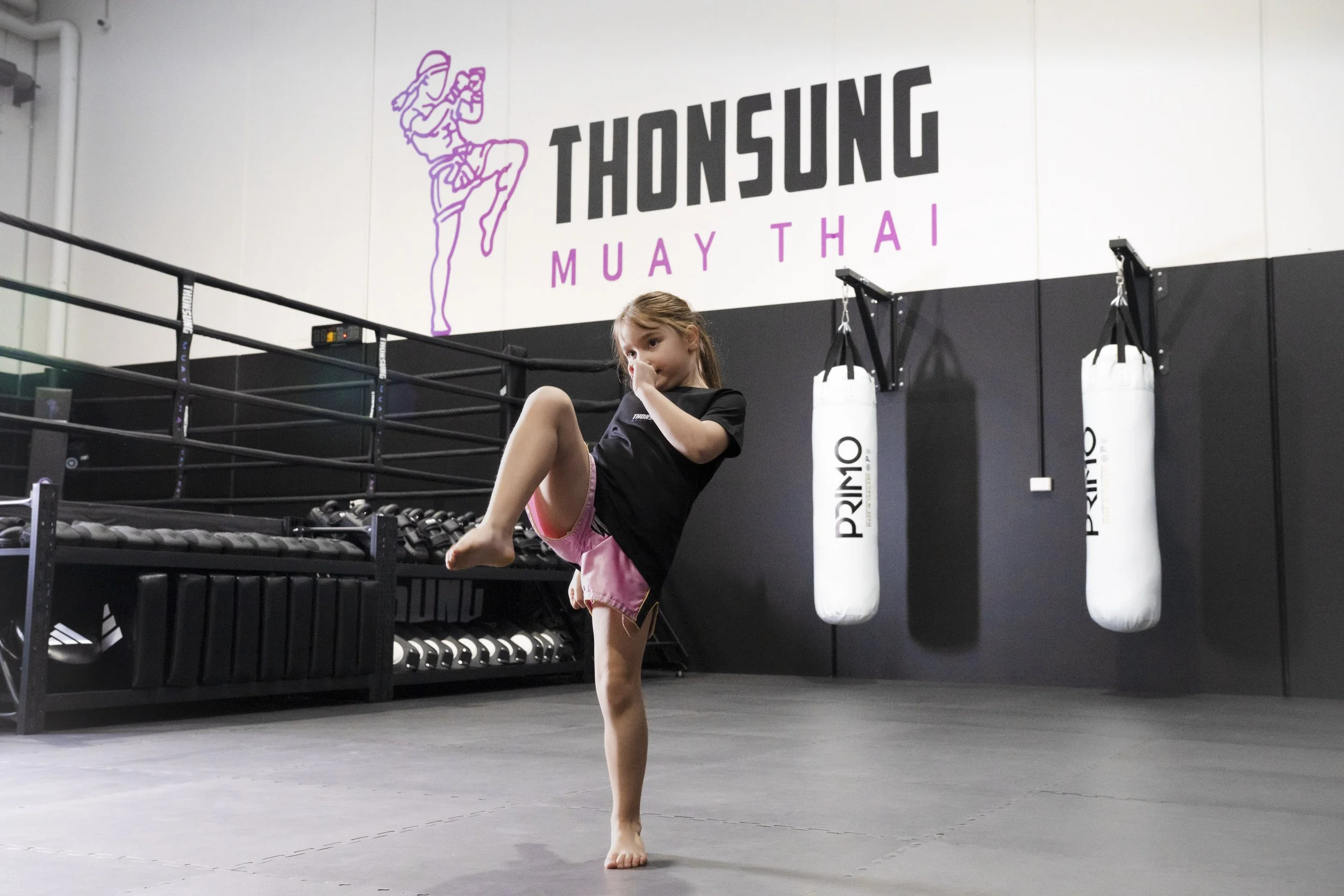 Thonsung Muay Thai Juniors class Epping Victoria - Junior student executing a knee on the mats.
