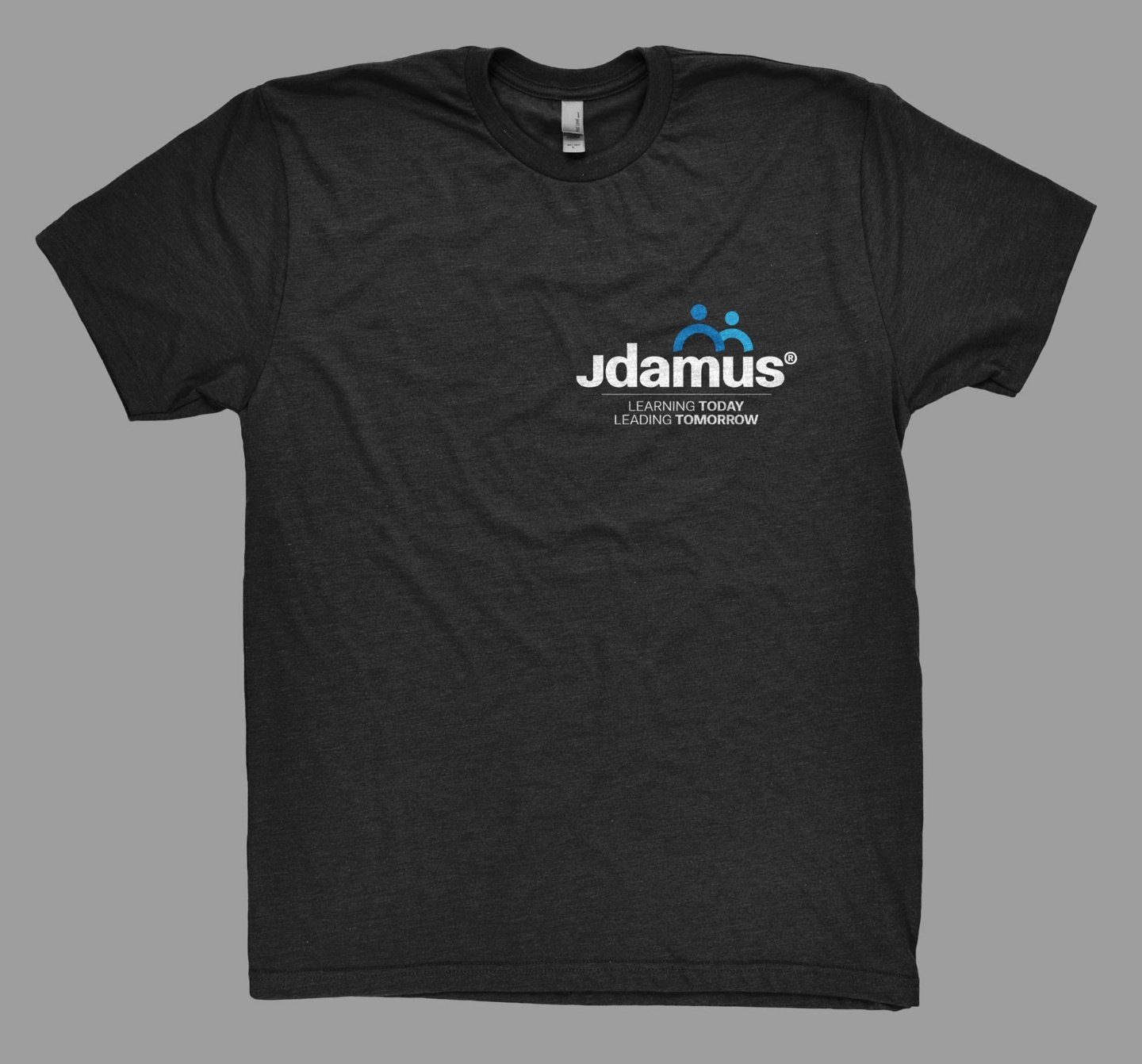 Black t-shirt with a logo and text that reads 'Jdamus' and 'Learning Today, Leading Tomorrow.'
