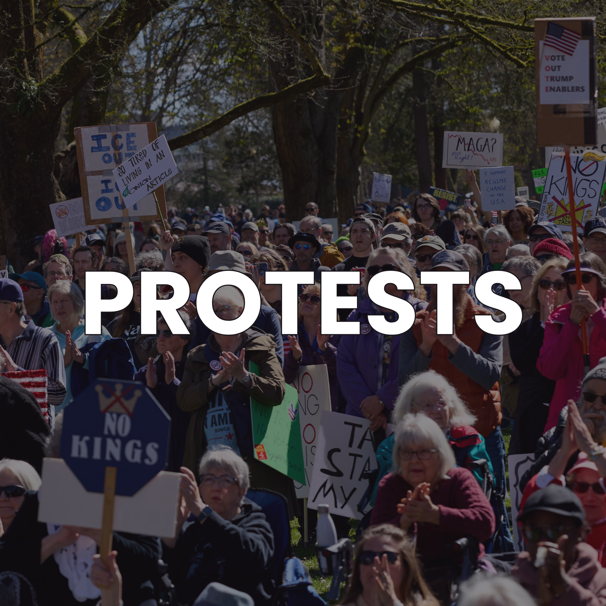A large group of people gathered outdoors holding various protest signs at an Indivisible Tacoma No Kings rally, with a large white overlay text reading 'PROTESTS'.