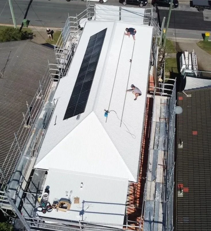 Solar panel installation on Gold Coast residential roof — licensed solar electrician SEQ — Hundy Electrical