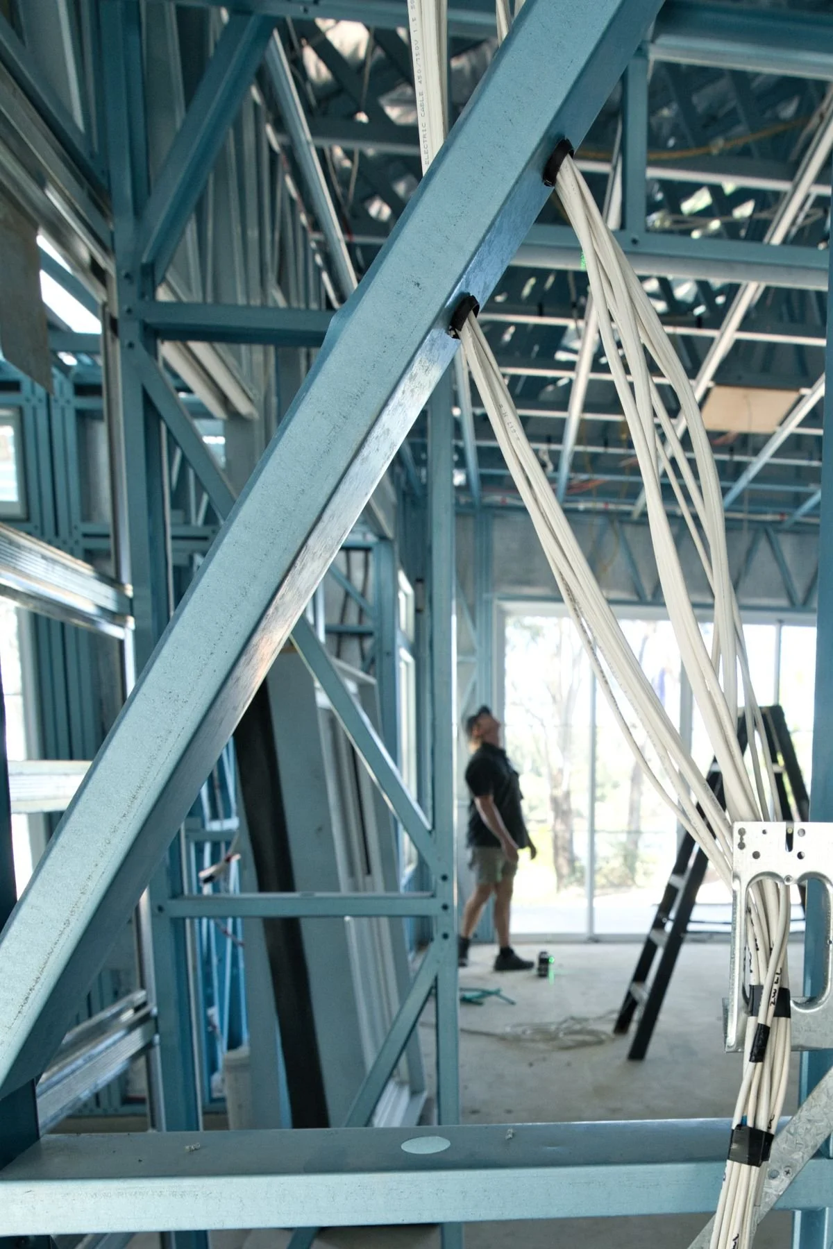 Commercial electrical rough-in with steel framing and cabling installation by Hundy Electrical on Gold Coast