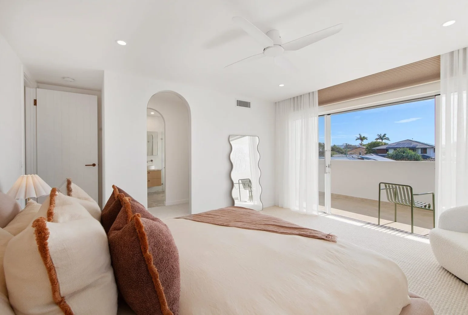 Completed residential bedroom electrical installation with LED downlights and ceiling fan by Hundy Electrical