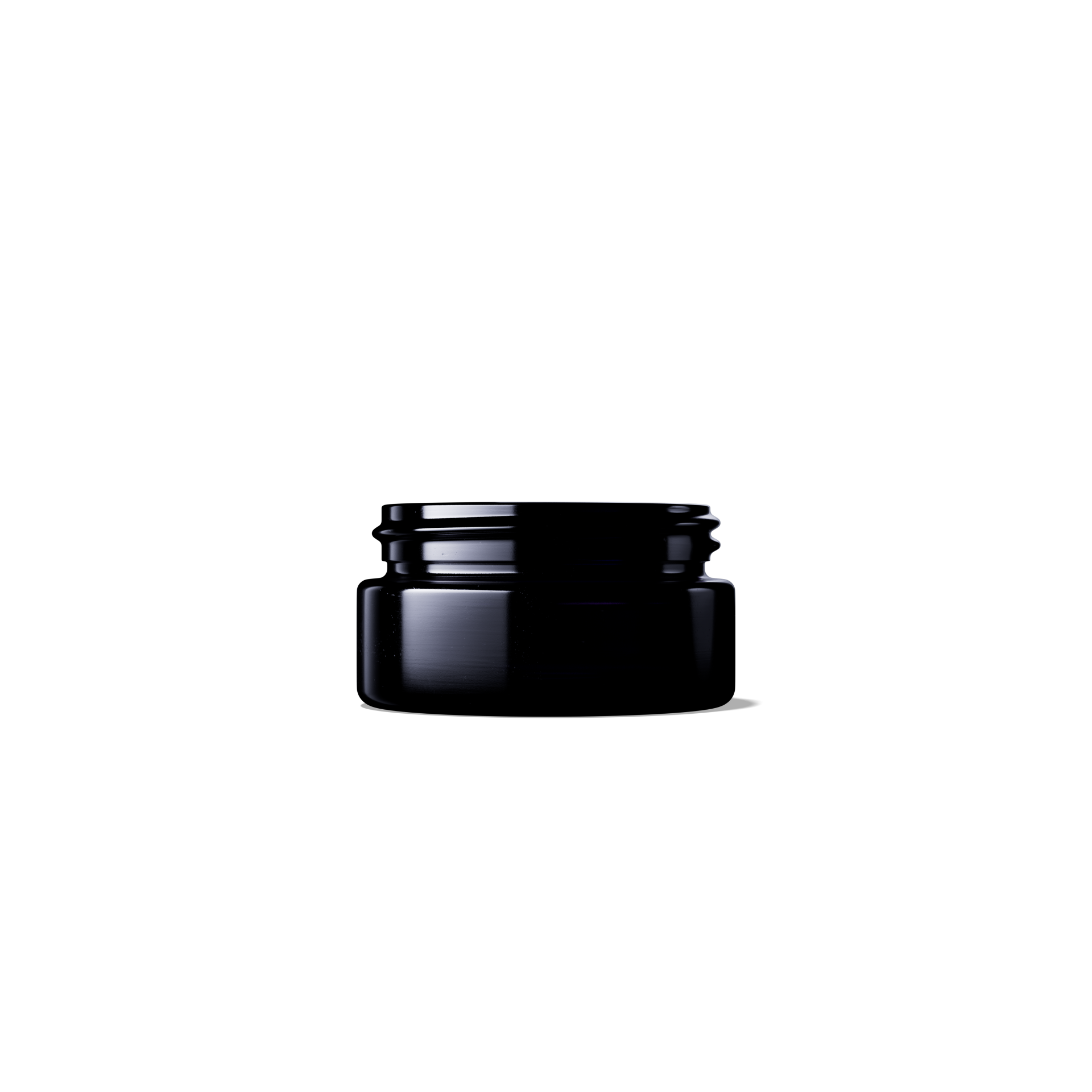 Close-up of a camera lens on a black background, with reflections and a hint of red in the lens.