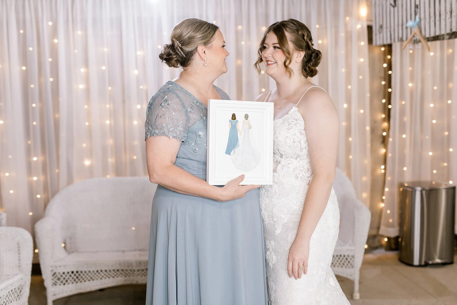 Bride shares a quiet moment with her mother before the ceremony at The Gish Barn wedding in Rittman, Ohioplanned by MTM Weddings & Events.