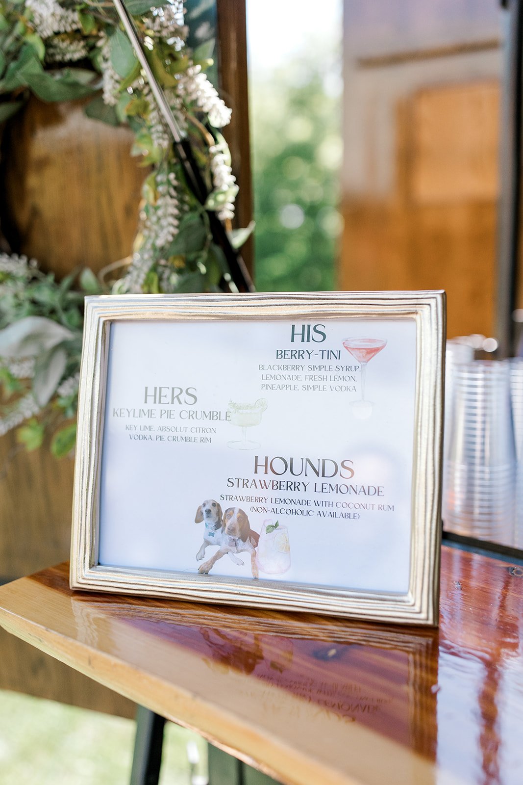 he Thirsty Filly mobile bar serving signature cocktails during The Gish Barn wedding in Rittman, Ohio, coordinated by MTM Weddings & Events.