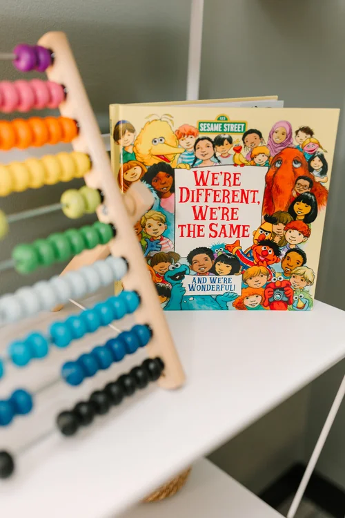Colorful abacus and children's books — Neurodiversity Affirming Therapy at 143 Speech Therapy