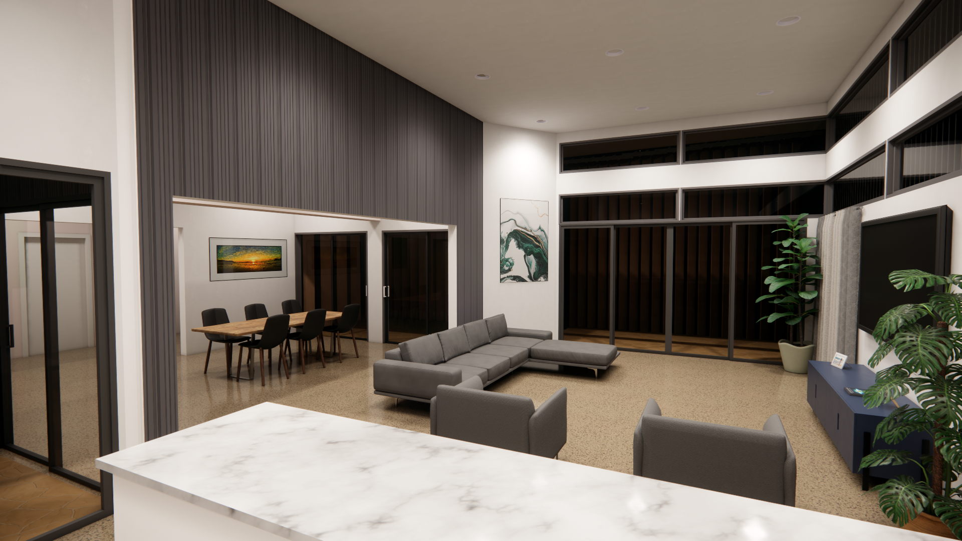 Open-plan kitchen overlooking the lounge, featuring the exposed shipping container as a statement wall. Large openings connect seamlessly to the courtyard and preserve beach views, creating a bright, social, and flexible living space.