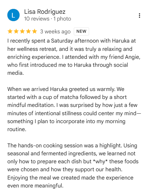 Screenshot of a five-star review from Lisa Rodriguez about her wellness retreat experience with Haruka, mentioning social media introduction, a cup of matcha, mindfulness meditation, and a hands-on cooking session.