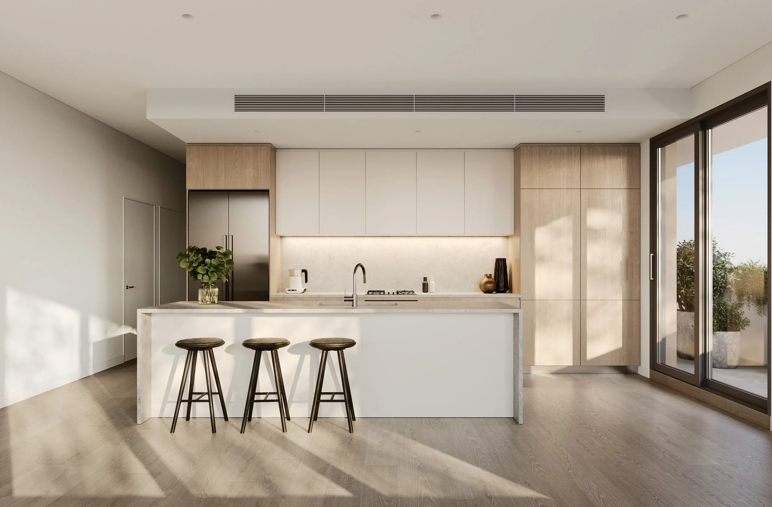 Modern kitchen with white island, light wood cabinetry, stainless steel refrigerator, sliding glass door, and three bar stools.
