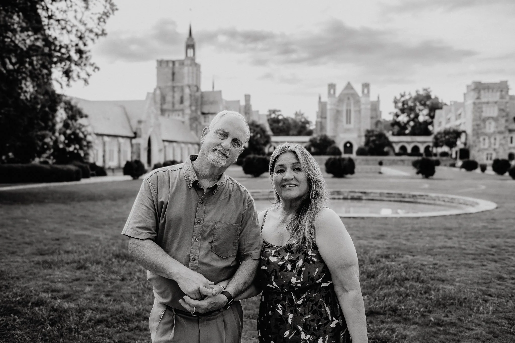 black and white photo of older couple holding hands at Berry College