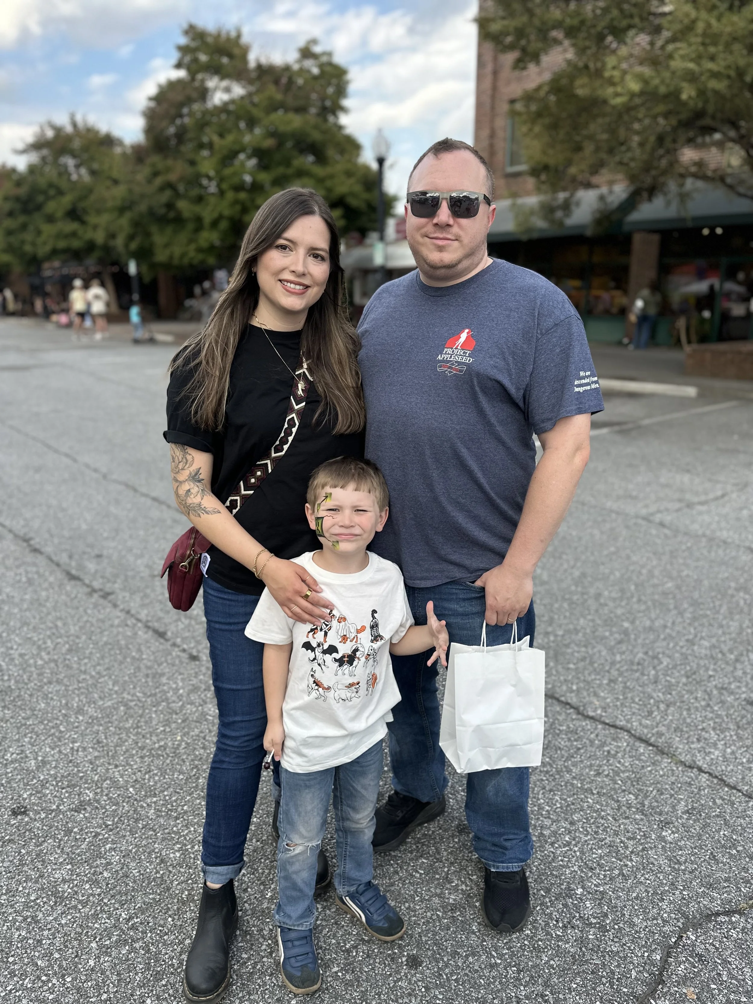 Family portrait in downtown Cartersville, Georgia by Raquel Zane Photography