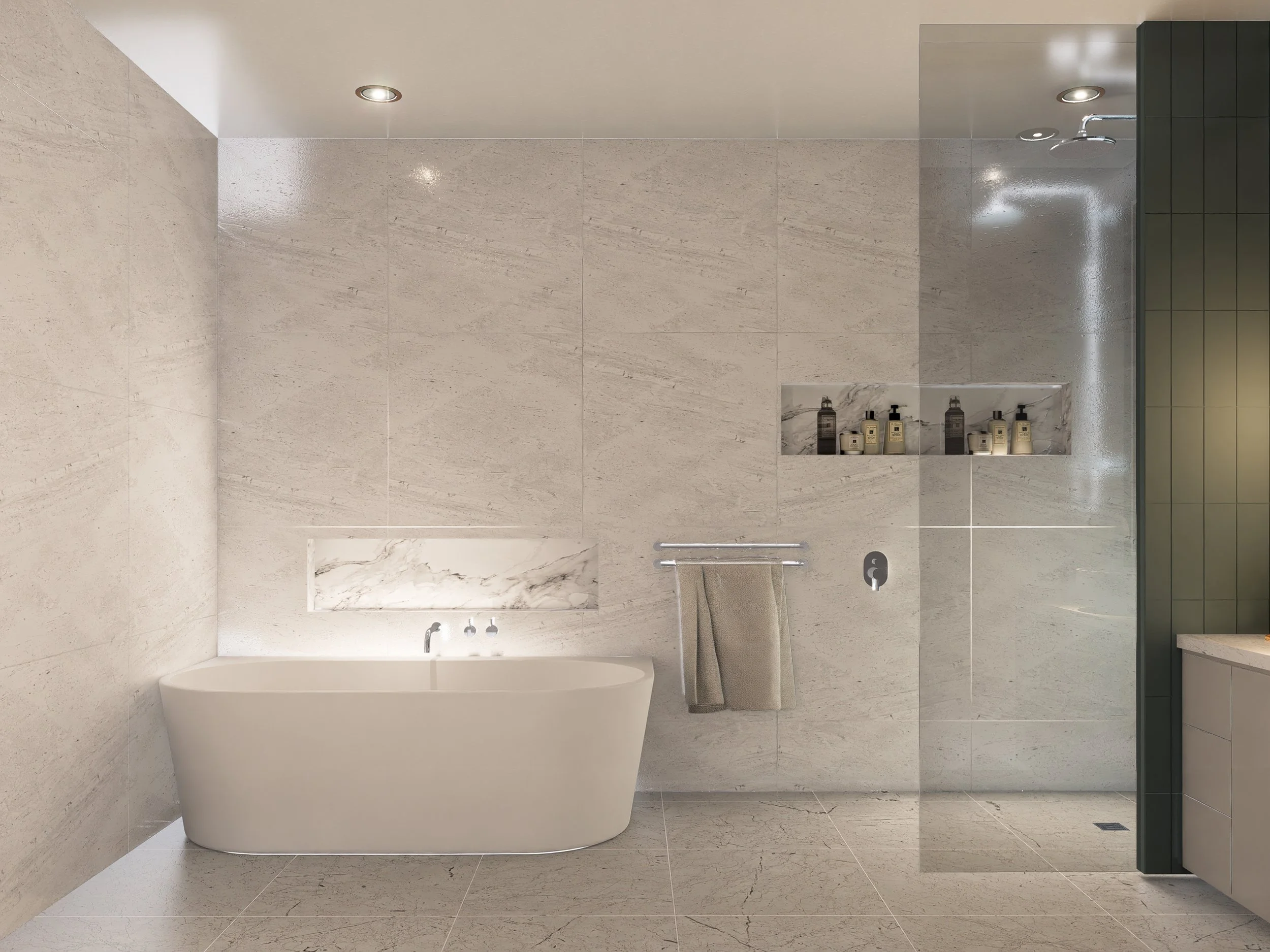 Modern bathroom with a free-standing bathtub, tiled walls, recessed shelves with toiletries, a towel hanging on a rail, and a glass shower enclosure.
