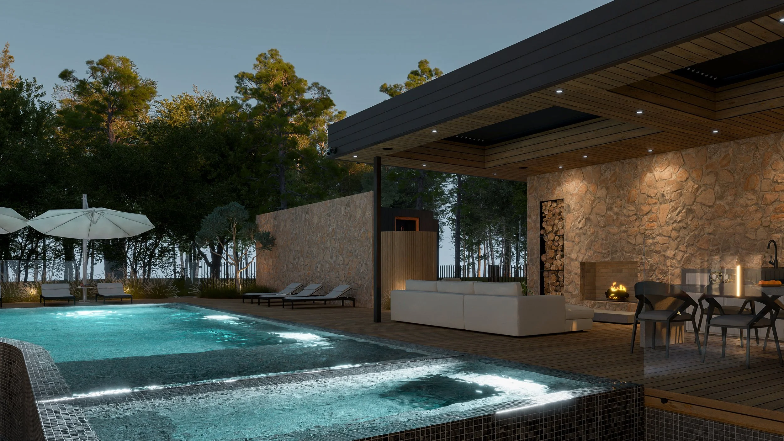 Modern outdoor pool area with lounge chairs, umbrellas, a stone fireplace, and seating surrounded by trees at dusk.