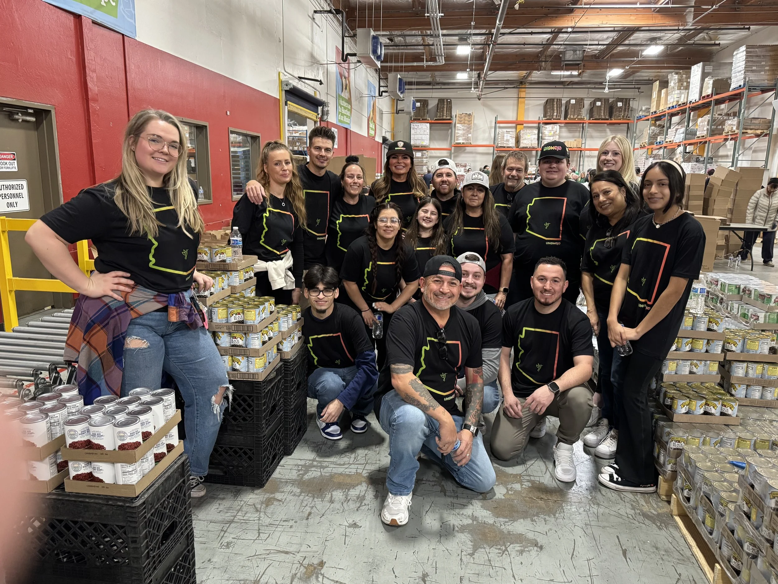 Taylor Cole of Be Sound PR coordinates a team volunteer event at St. Mary's Food Bank