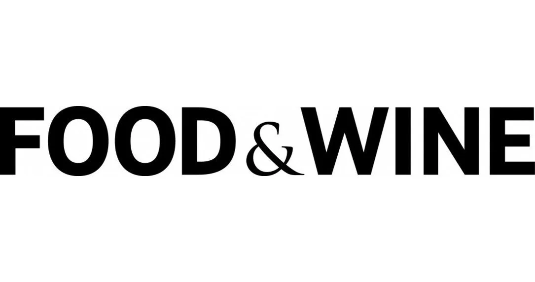 The text 'FOOD & WINE' in bold black font on a white background.
