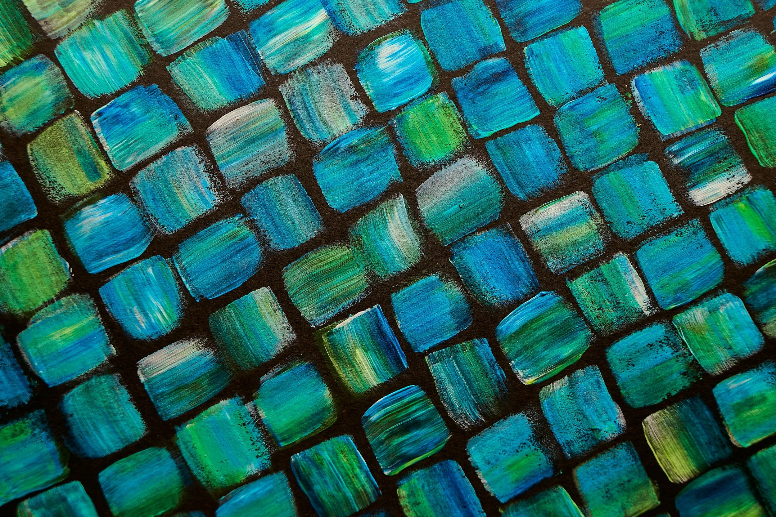 A detailed abstract mosaic in blue and green, symbolizing HamptonTCI's rigorous executive search process that carefully matches individual talent to precise client needs, ensuring cultural fit using  structured briefings and transparent processes