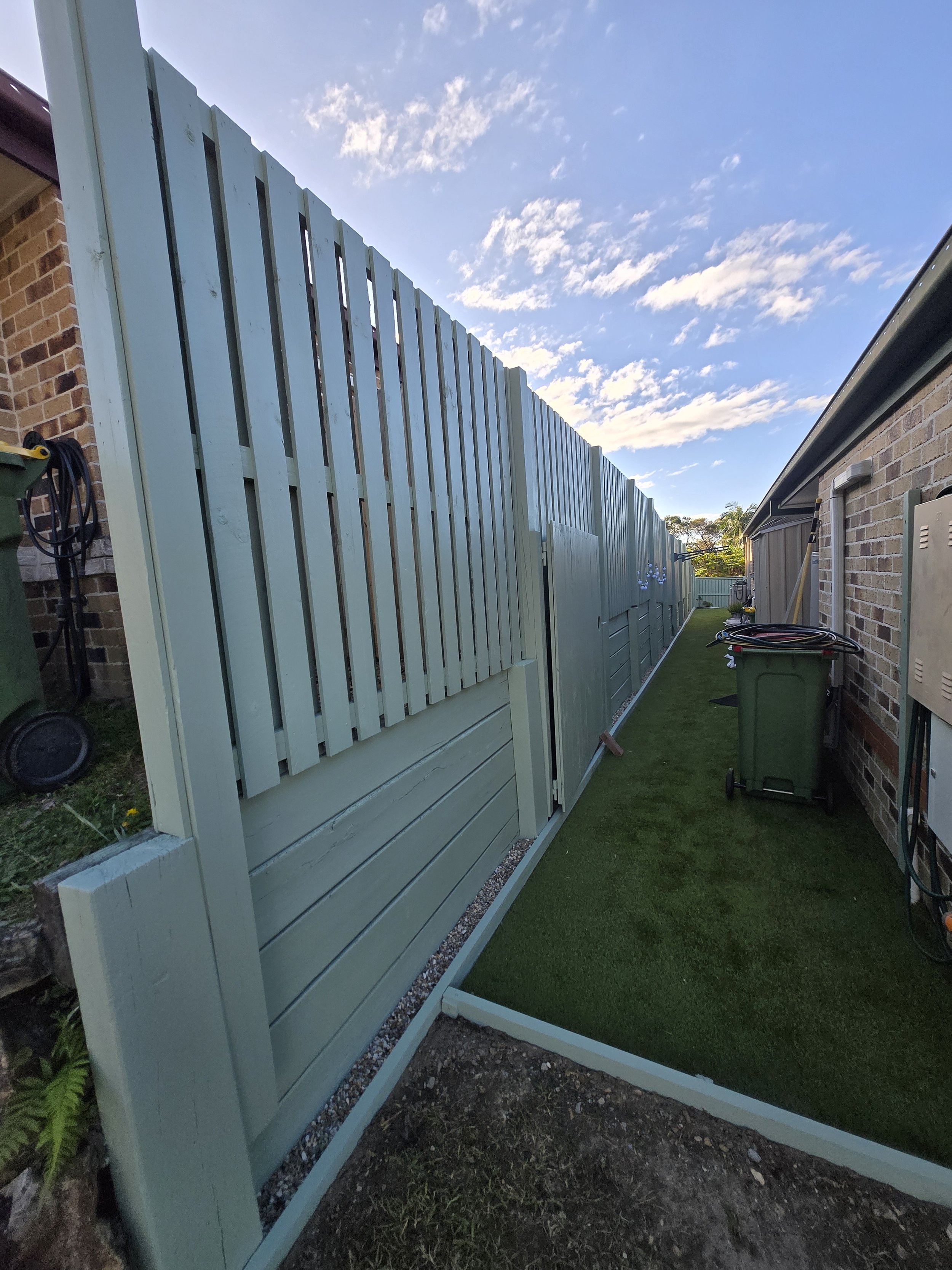 she paints outdoor fence paint