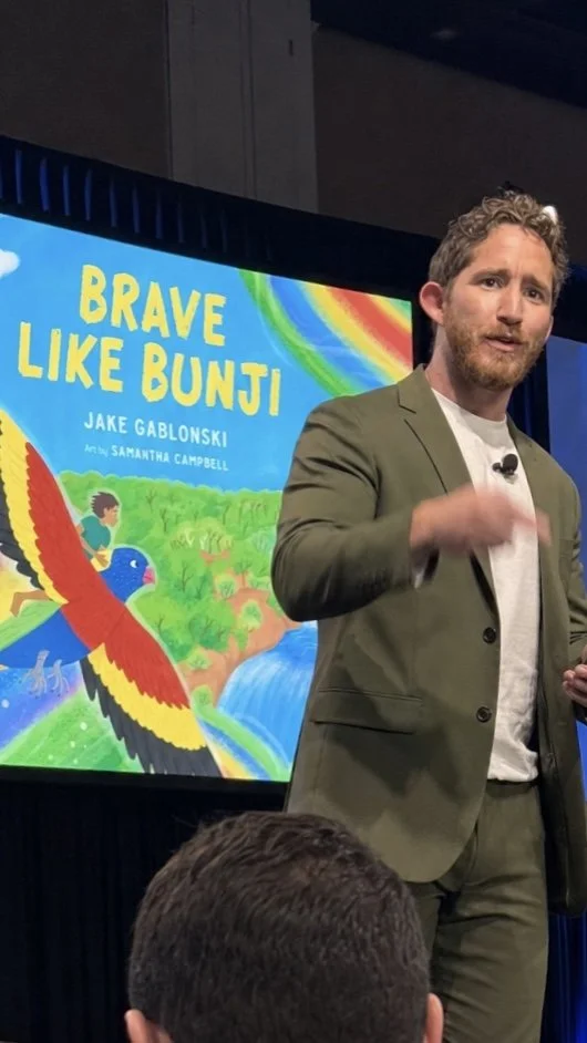 Jake Gablonski doing a corporate presentation on Brave Like Bunji