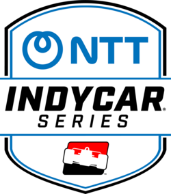 NTT logo on a shield-shaped background with a racing helmet graphic at the bottom
