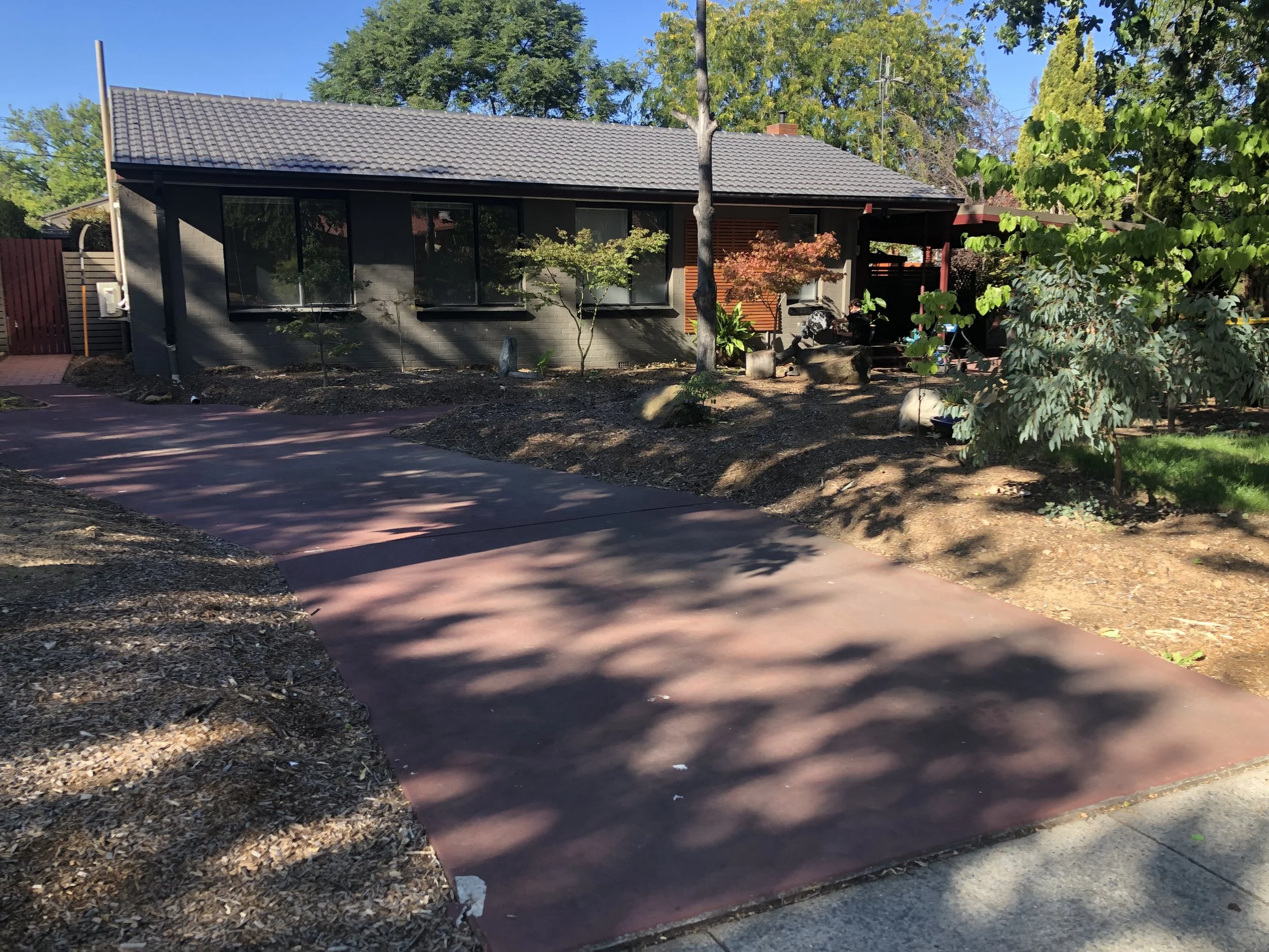 An image of a driveway in Red Hill before Connors cleaning pressure washing
