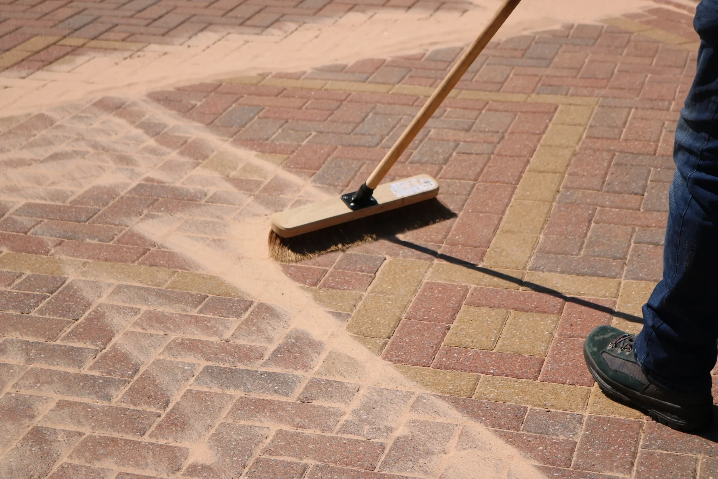 Driveway pavers cleaning and resanding.