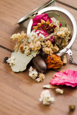 Concept image representing dried herbs and flowers used for herbal tea