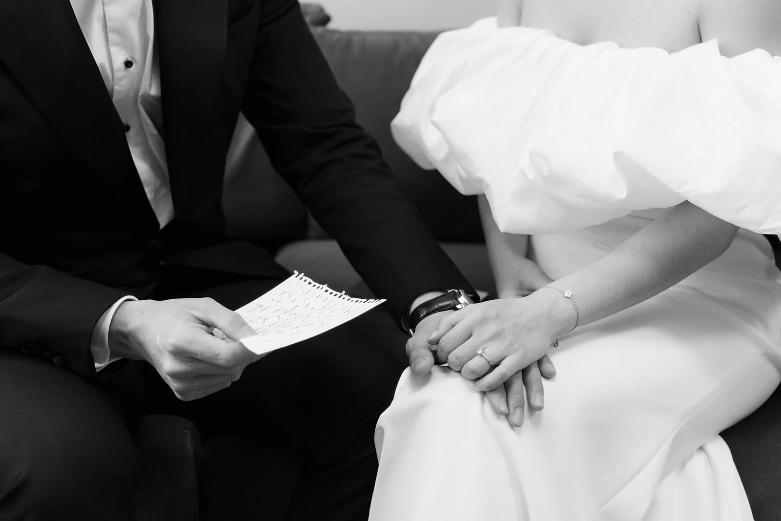 Couple is sharing their private vows before the ceremony in an intimate setting with hands holding on their wedding day in Chicago