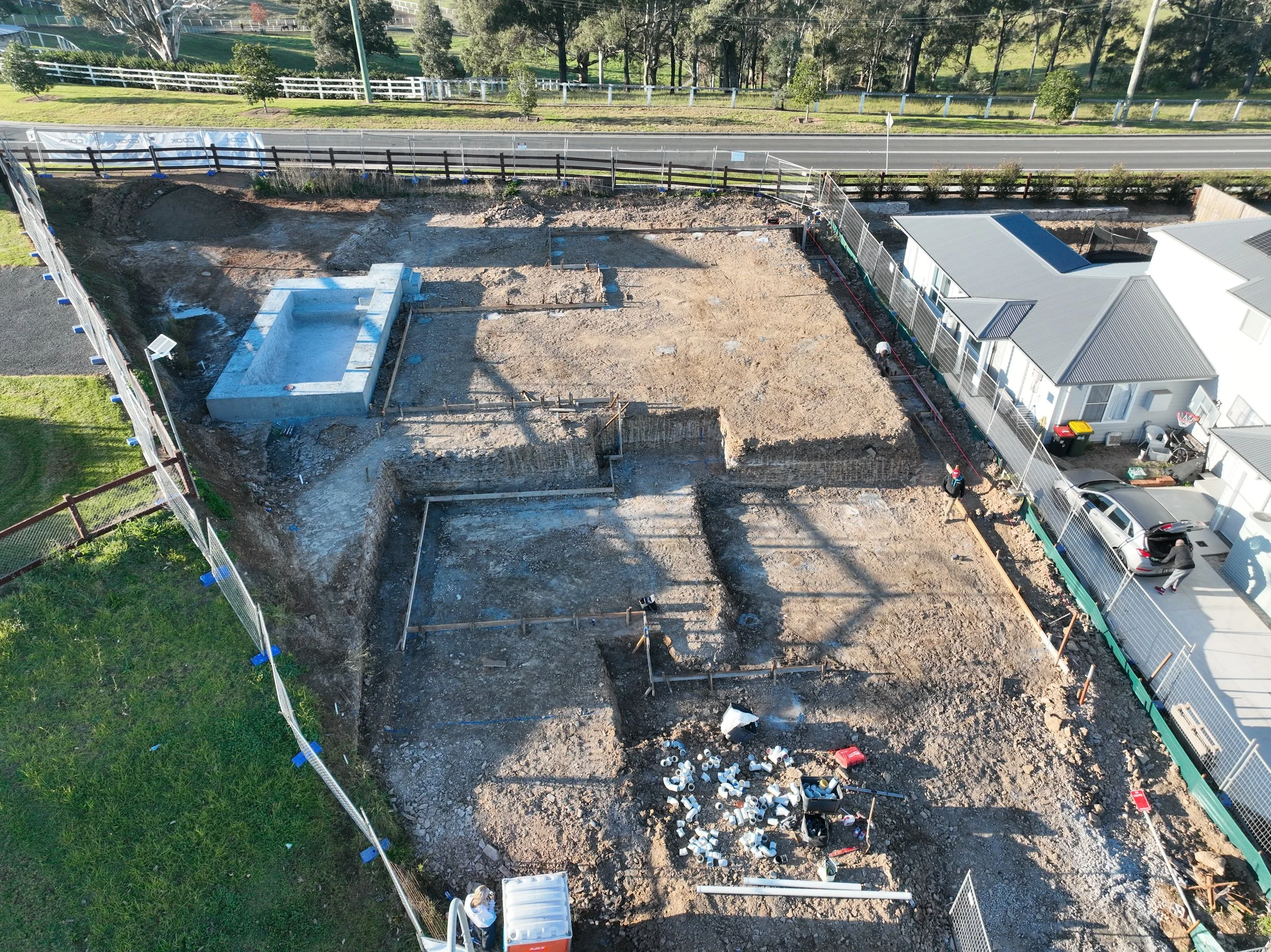 Construction site with plumbing services by Kennedys in Sydney