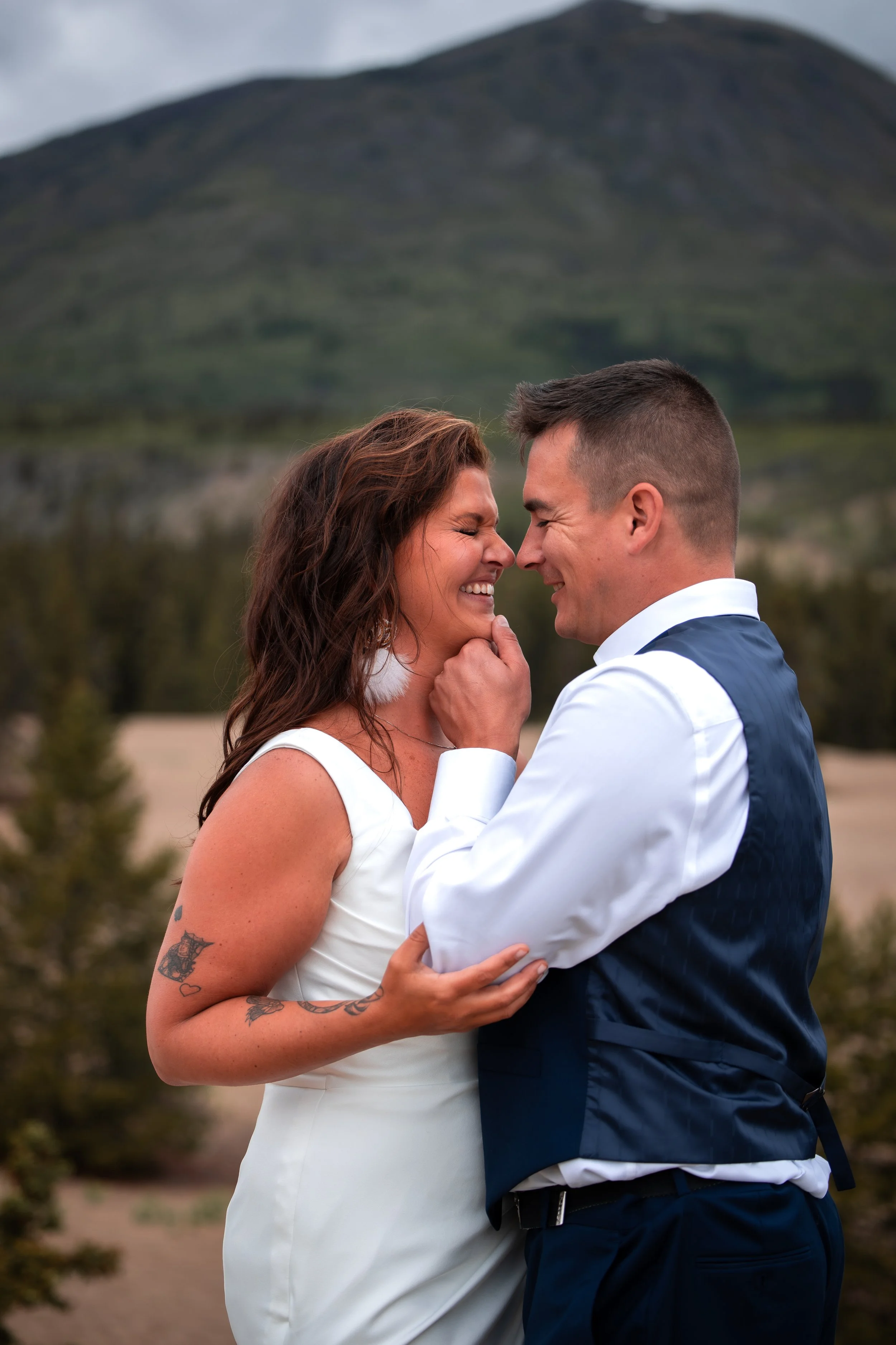 couple laughing on wedding day