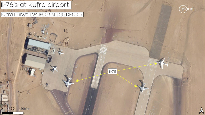 Aerial view of Kufra Airport in Libya showing three planes on the tarmac, a runway, and surrounding desert landscape. Text indicates aircraft IL-76 at Kufra airport.