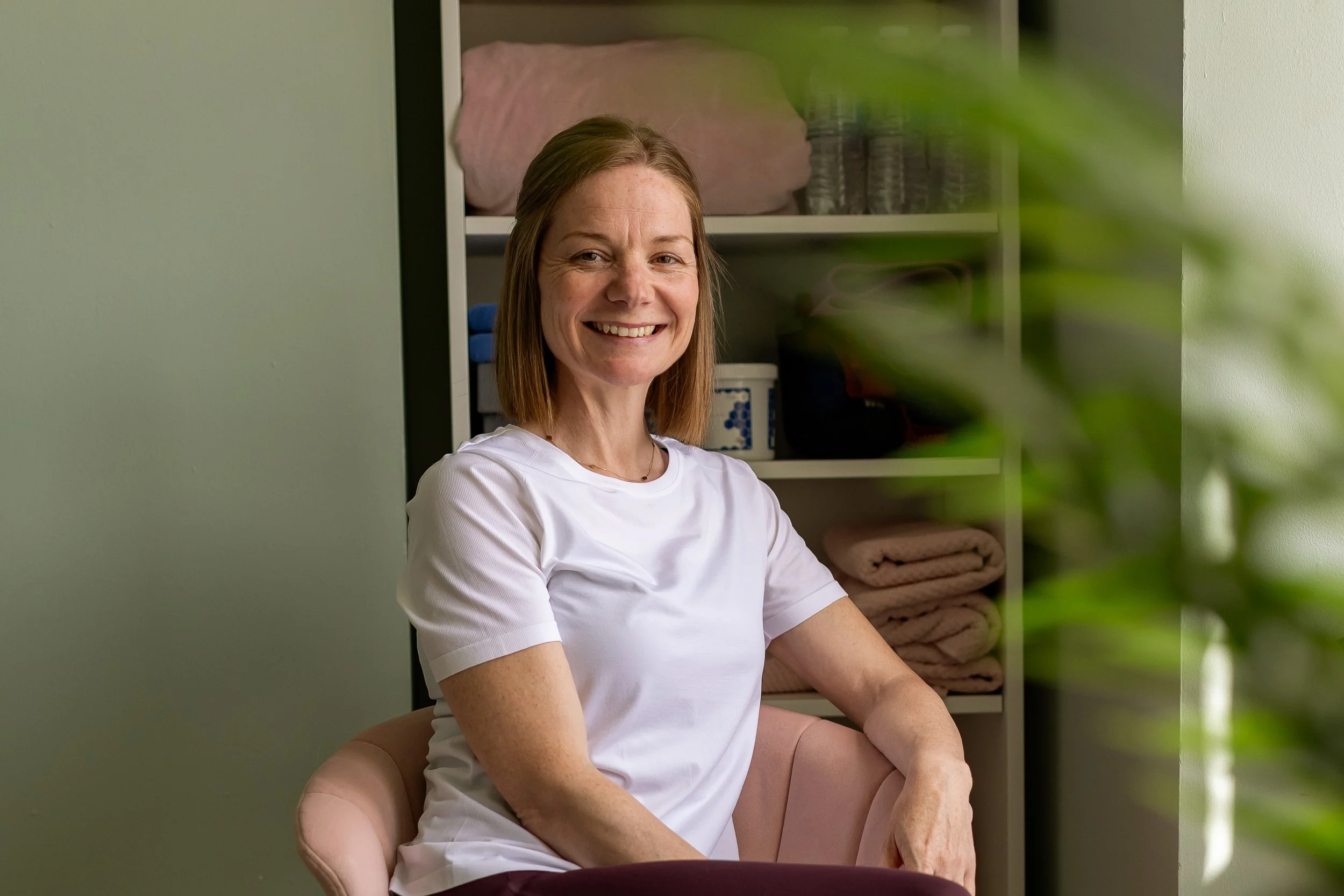 Jenny sitting in the Core Pilates Oban studio, where she offers clinical Pilates, rehabilitation and women’s health support.